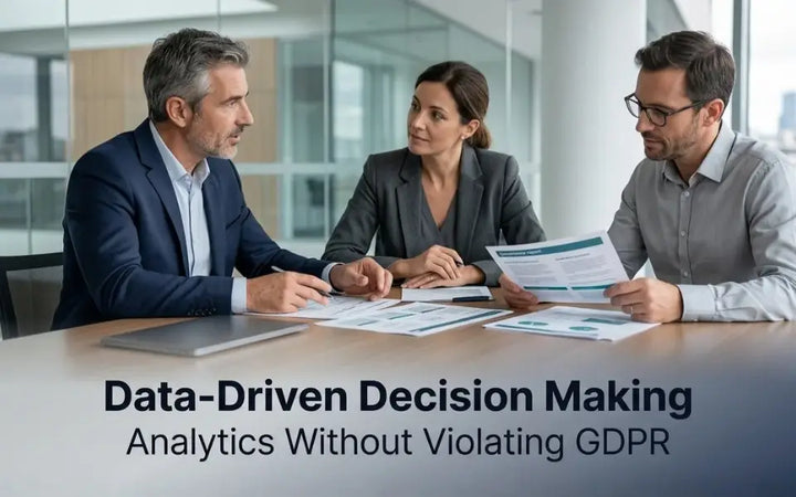 Three business professionals reviewing reports and analytics during a meeting focused on data-driven decision making and GDPR-compliant data management in a modern office environment.